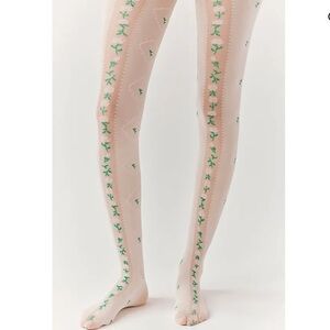 7081. Free People Ribboning Floral Tights